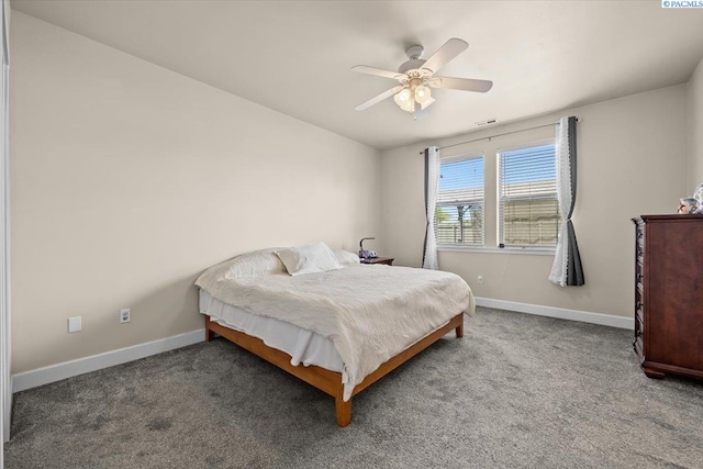 406 W 49th Ave, Kennewick, WA 99337 - carpeted bedroom featuring baseboards and a ceiling fan