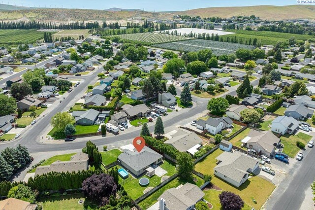 406 W 49th Ave, Kennewick, WA 99337 - aerial perspective of suburban area featuring a mountain backdrop and abundant farmland
