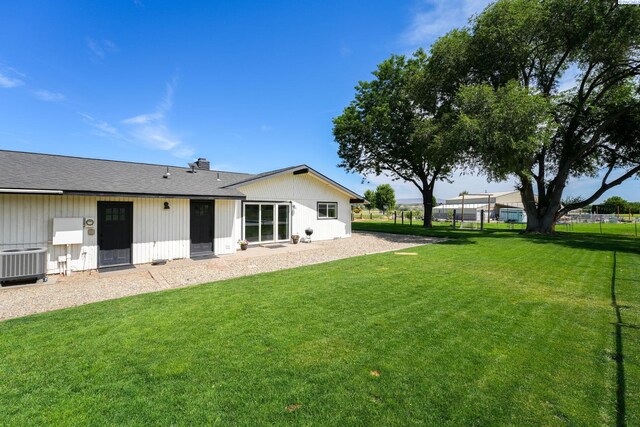10401 N Mcdonald Rd, Prosser, WA 99350 - rear view of house featuring a chimney