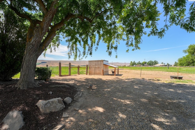 10401 N Mcdonald Rd, Prosser, WA 99350 - view of yard featuring an outdoor structure and a view of rural / pastoral area