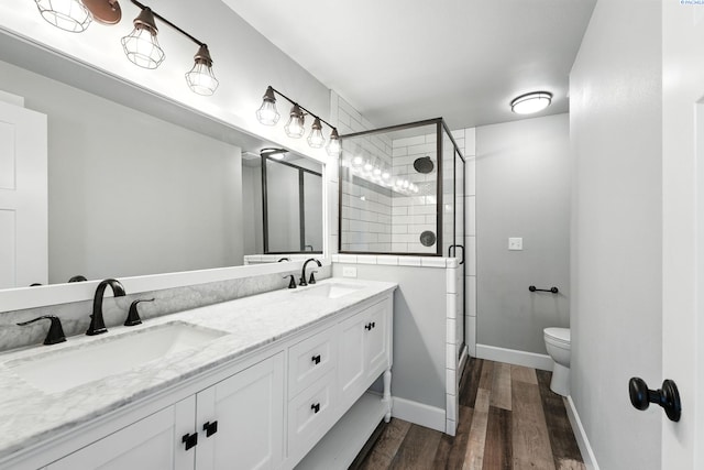 10401 N Mcdonald Rd, Prosser, WA 99350 - full bath featuring a shower stall, wood finished floors, and double vanity