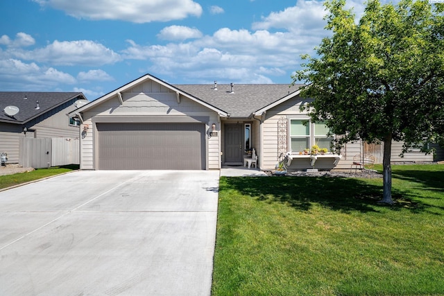 6903 Boulder Dr, Pasco, WA 99301 - ranch-style home with an attached garage, driveway, and a shingled roof