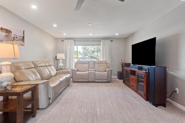 carpeted living room with baseboards and recessed lighting