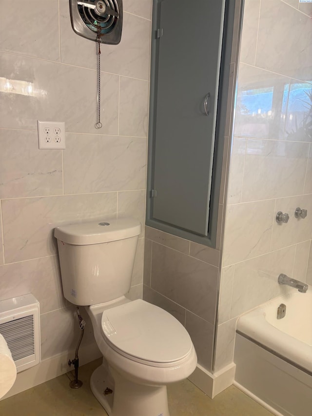 310 S Culton St, Palouse, WA 99161 - full bathroom with tile walls and heating unit