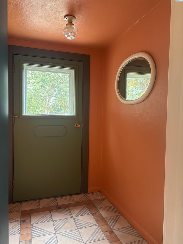 310 S Culton St, Palouse, WA 99161 - doorway featuring a textured ceiling