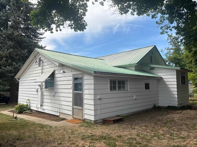 310 S Culton St, Palouse, WA 99161 - view of side of home featuring a metal roof