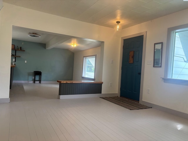 310 S Culton St, Palouse, WA 99161 - entrance foyer with baseboards and beam ceiling