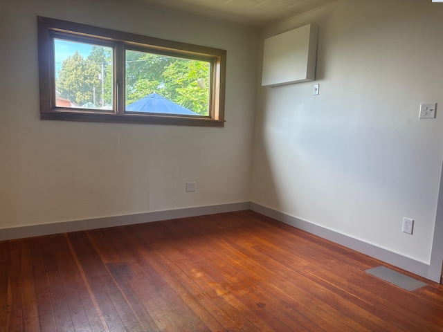 310 S Culton St, Palouse, WA 99161 - unfurnished room with wood-type flooring and baseboards