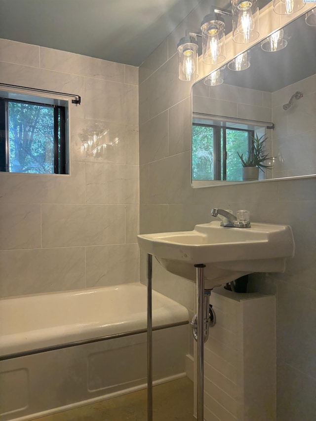 310 S Culton St, Palouse, WA 99161 - full bath featuring tile walls and  shower combination
