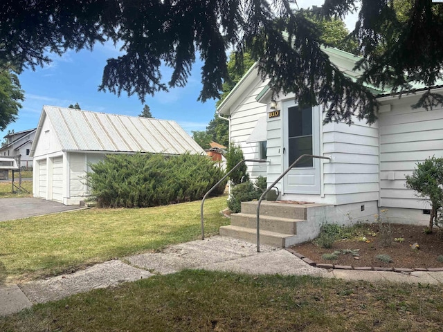 310 S Culton St, Palouse, WA 99161 - view of property exterior with an outbuilding and a lawn