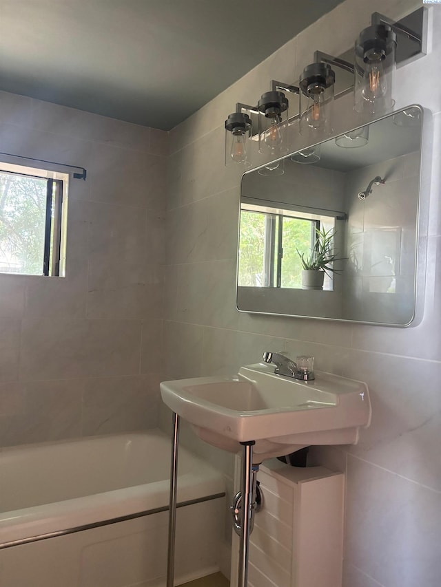 310 S Culton St, Palouse, WA 99161 - bathroom featuring shower / washtub combination and tile walls