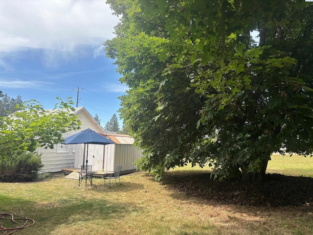 310 S Culton St, Palouse, WA 99161 - view of grassy yard with an outdoor structure