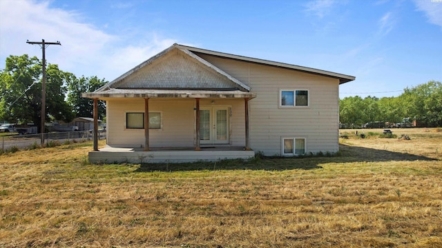 230 E 27th Ave, Kennewick, WA 99337 - rear view of house with french doors and covered porch