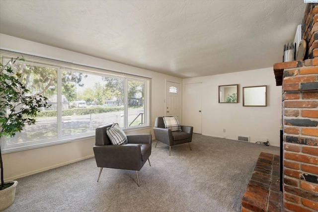 living area with plenty of natural light, carpet floors, and baseboards