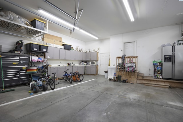 92104 E Sagebrush Rd, Kennewick, WA 99338 - garage featuring stainless steel refrigerator with ice dispenser