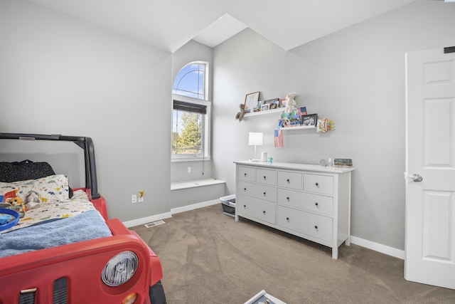 92104 E Sagebrush Rd, Kennewick, WA 99338 - carpeted bedroom with baseboards and vaulted ceiling