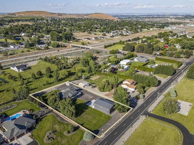 92104 E Sagebrush Rd, Kennewick, WA 99338 - aerial view of property and surrounding area featuring nearby suburban area and property boundaries highlighted