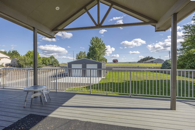 92104 E Sagebrush Rd, Kennewick, WA 99338 - wooden deck featuring an outbuilding, a yard, and a detached garage