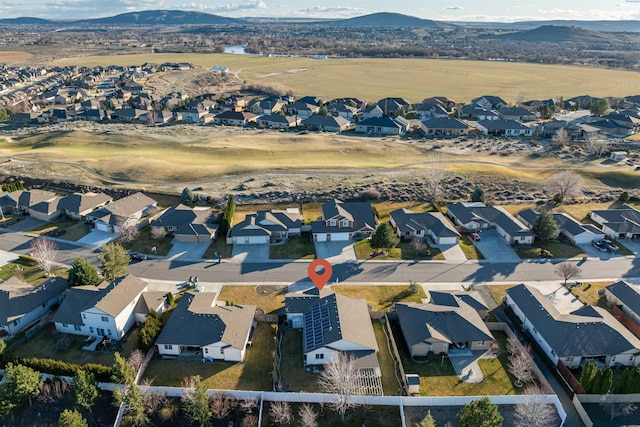 bird's eye view featuring a residential view and a mountain view