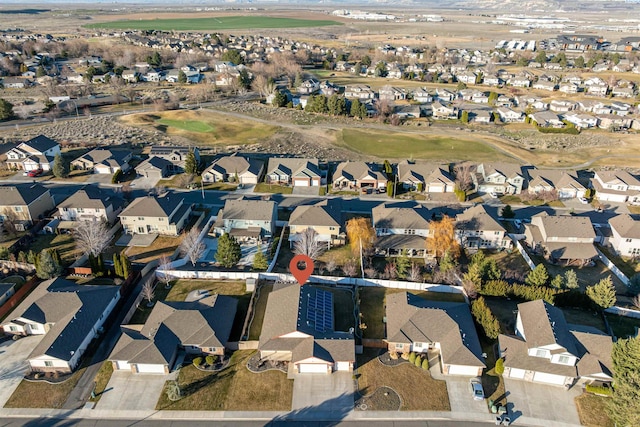 aerial view with view of golf course and a residential view