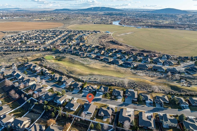 bird's eye view featuring a residential view and a mountain view