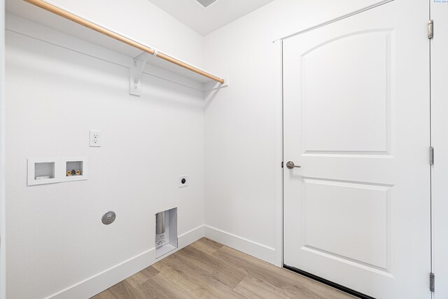 1613 Diamond Ave, Grandview, WA 98930 - laundry room featuring light wood-style floors, electric dryer hookup, washer hookup, and baseboards