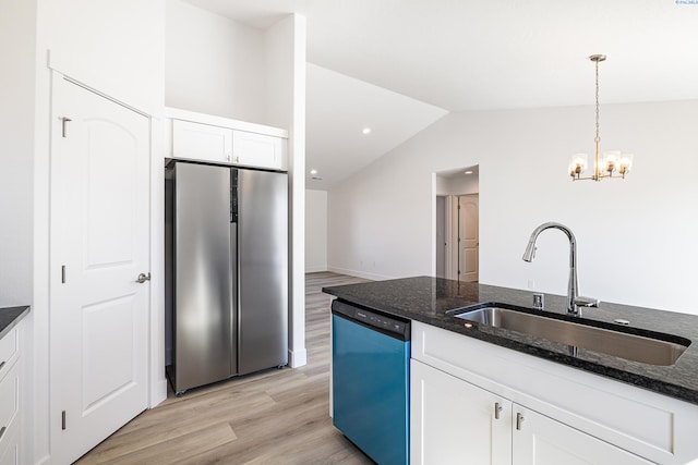 1613 Diamond Ave, Grandview, WA 98930 - kitchen with freestanding refrigerator, dishwasher, a sink, lofted ceiling, and dark stone counters