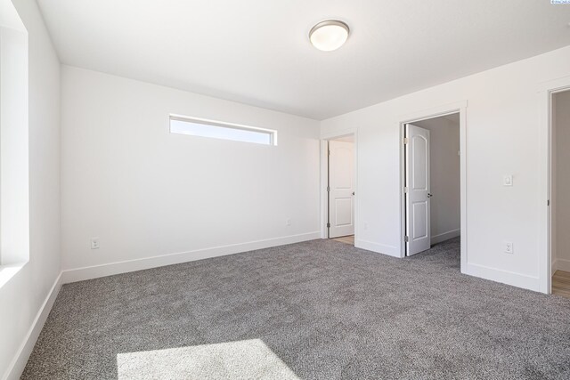 1613 Diamond Ave, Grandview, WA 98930 - unfurnished bedroom featuring carpet flooring and baseboards