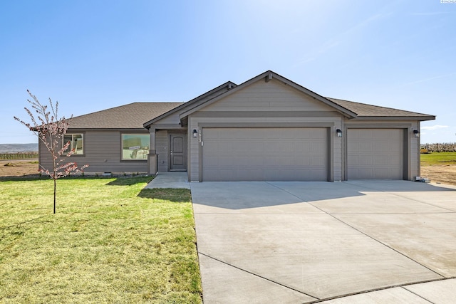 1613 Diamond Ave, Grandview, WA 98930 - ranch-style house featuring concrete driveway, an attached garage, a front lawn, and a shingled roof