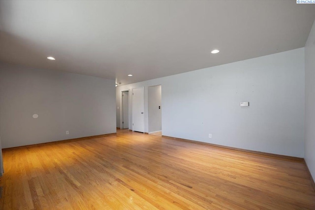 517 S Dawes St, Kennewick, WA 99336 - unfurnished room with light wood finished floors, recessed lighting, and baseboards
