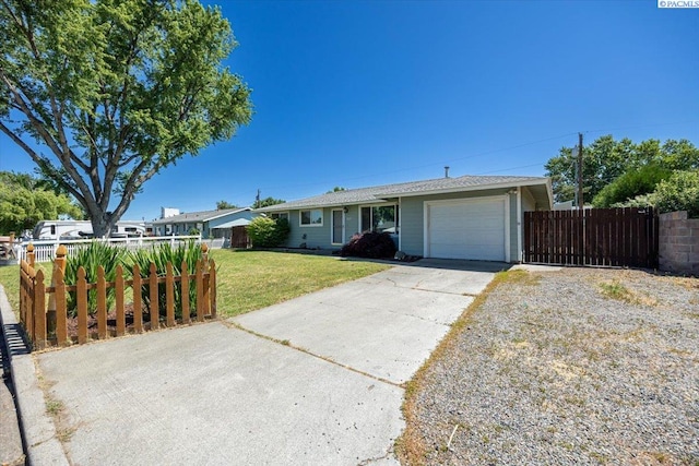 517 S Dawes St, Kennewick, WA 99336 - single story home with a garage and concrete driveway