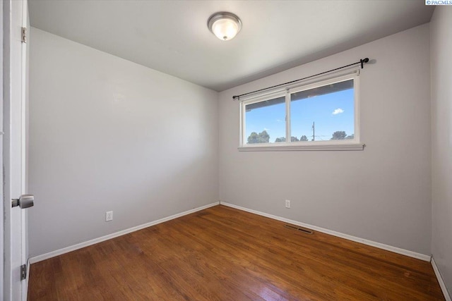 517 S Dawes St, Kennewick, WA 99336 - empty room with baseboards and wood finished floors