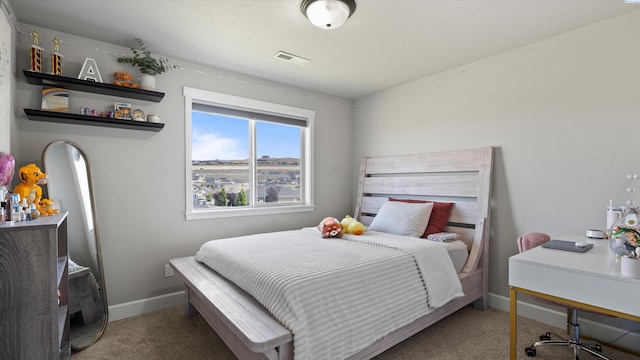 7104 W 31st Pl, Kennewick, WA 99338 - carpeted bedroom with baseboards