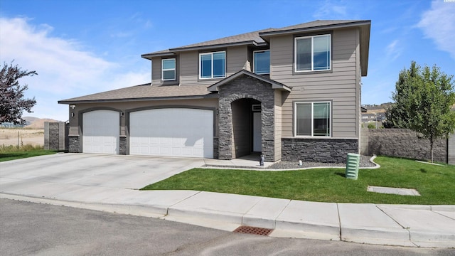 7104 W 31st Pl, Kennewick, WA 99338 - view of front of property featuring stone siding, driveway, an attached garage, and roof with shingles