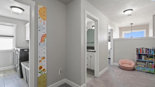7104 W 31st Pl, Kennewick, WA 99338 - playroom with washing machine and clothes dryer and baseboards