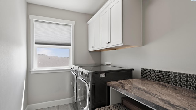 7104 W 31st Pl, Kennewick, WA 99338 - laundry area with cabinet space and washing machine and clothes dryer