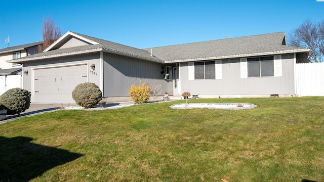 single story home with a garage and a front yard