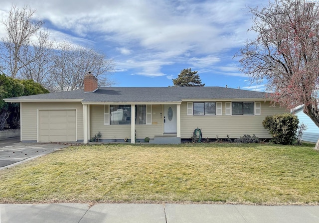 ranch-style home featuring a garage, a front yard, driveway, and a chimney