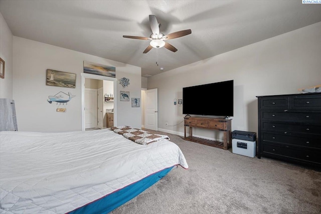 carpeted bedroom featuring ceiling fan and baseboards