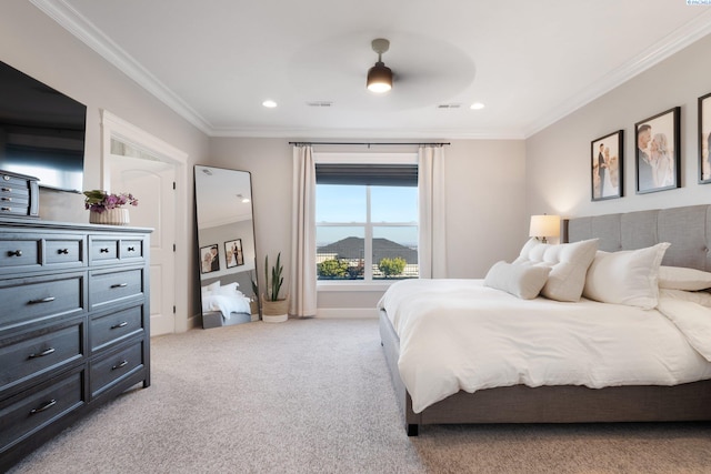 bedroom with recessed lighting, light carpet, crown molding, and baseboards