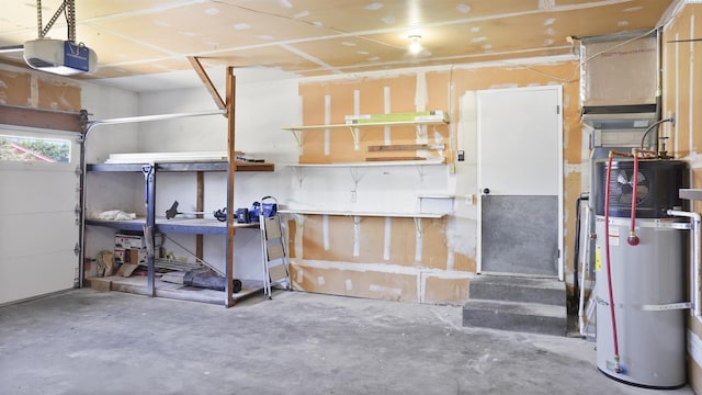 garage with a garage door opener and water heater