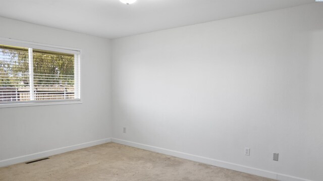 view of carpeted spare room