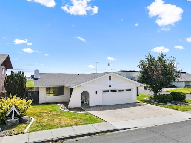 ranch-style house with a garage and a front yard