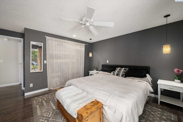 324 S Zinser St, Kennewick, WA 99336 - bedroom featuring wood finished floors, a textured ceiling, and ceiling fan