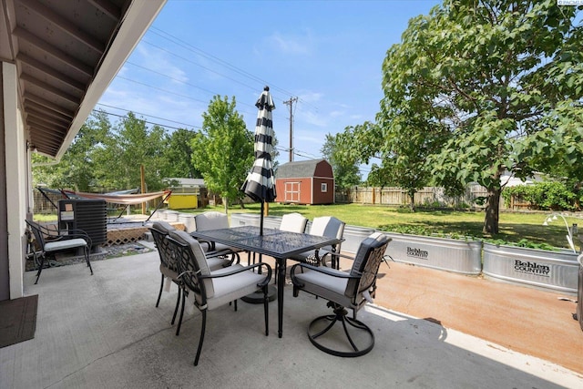 324 S Zinser St, Kennewick, WA 99336 - fenced backyard featuring outdoor dining area, a patio area, and a shed