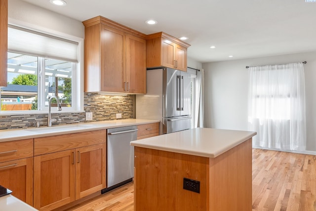 78 Whitten, Richland, WA 99354 - kitchen featuring a sink, appliances with stainless steel finishes, backsplash, light wood-type flooring, and recessed lighting