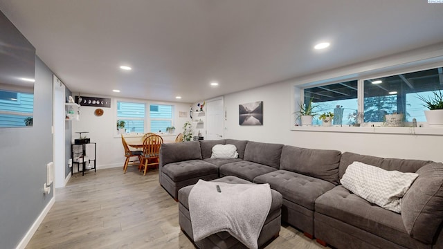 living room with light hardwood / wood-style floors