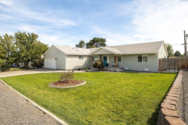 ranch-style home featuring a garage, covered porch, fence, and a front lawn