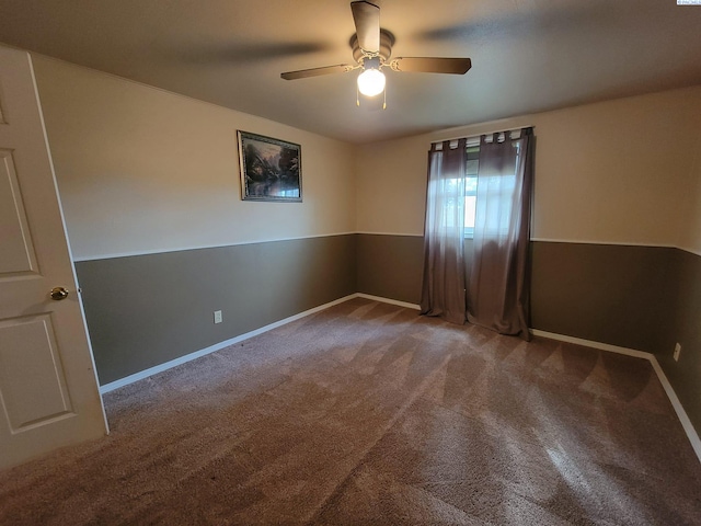 unfurnished room featuring ceiling fan and carpet