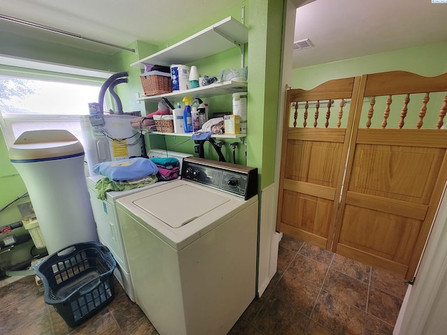 laundry area featuring washing machine and dryer